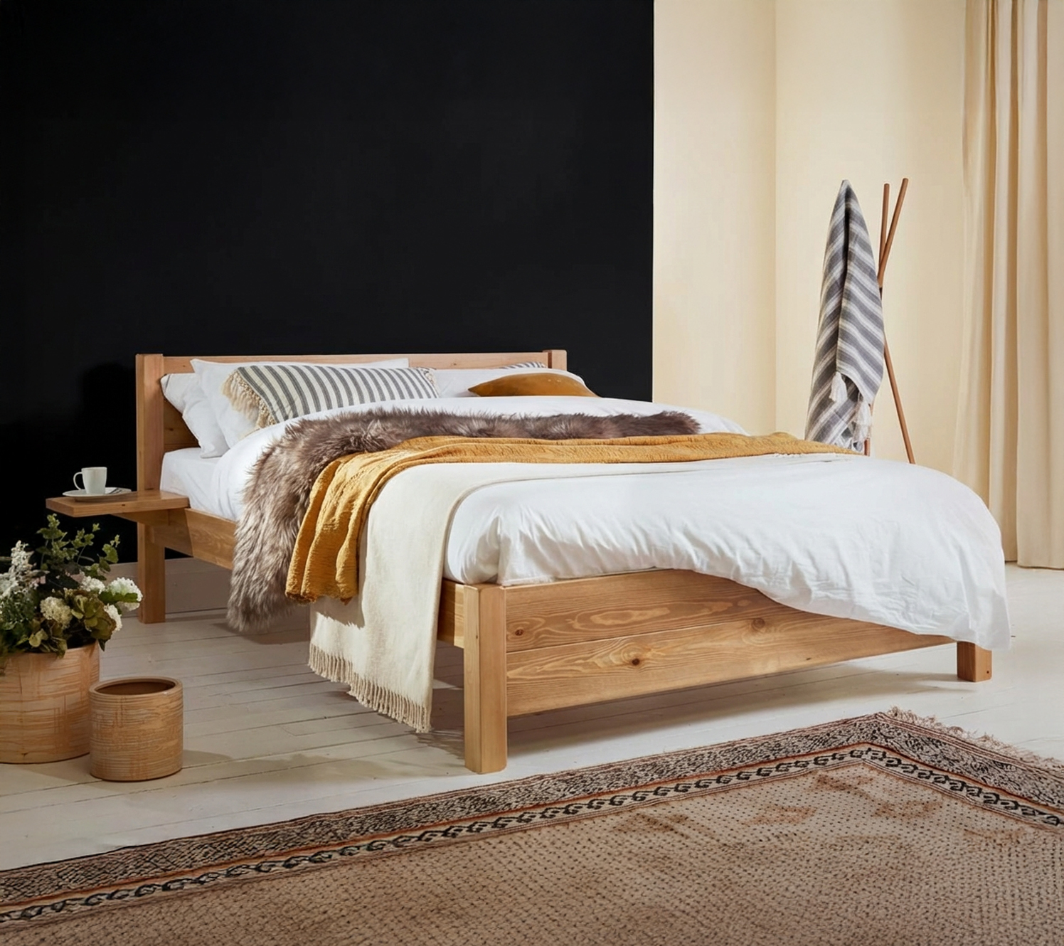 Black feature wall in black and cream bedroom